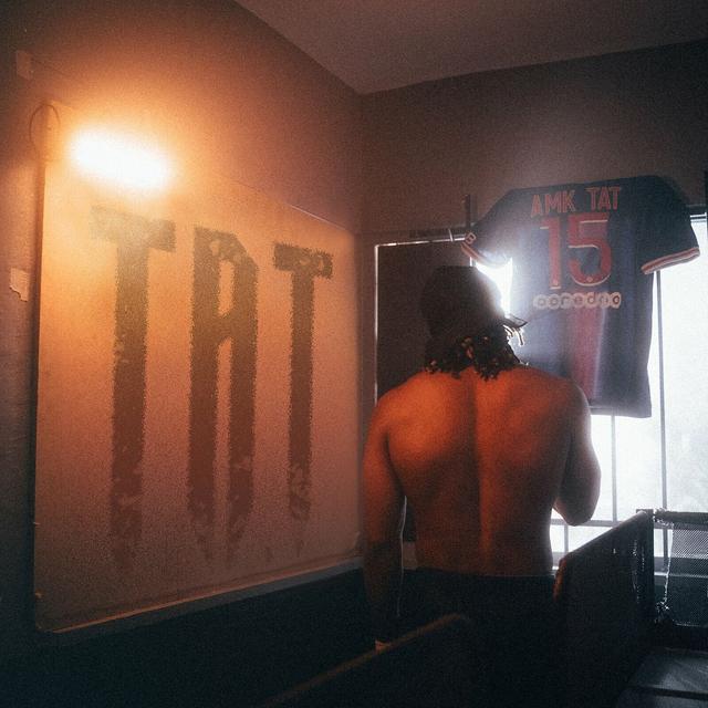 Album cover art for T.A.T