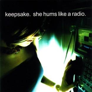 Album cover art for She Hums Like A Radio